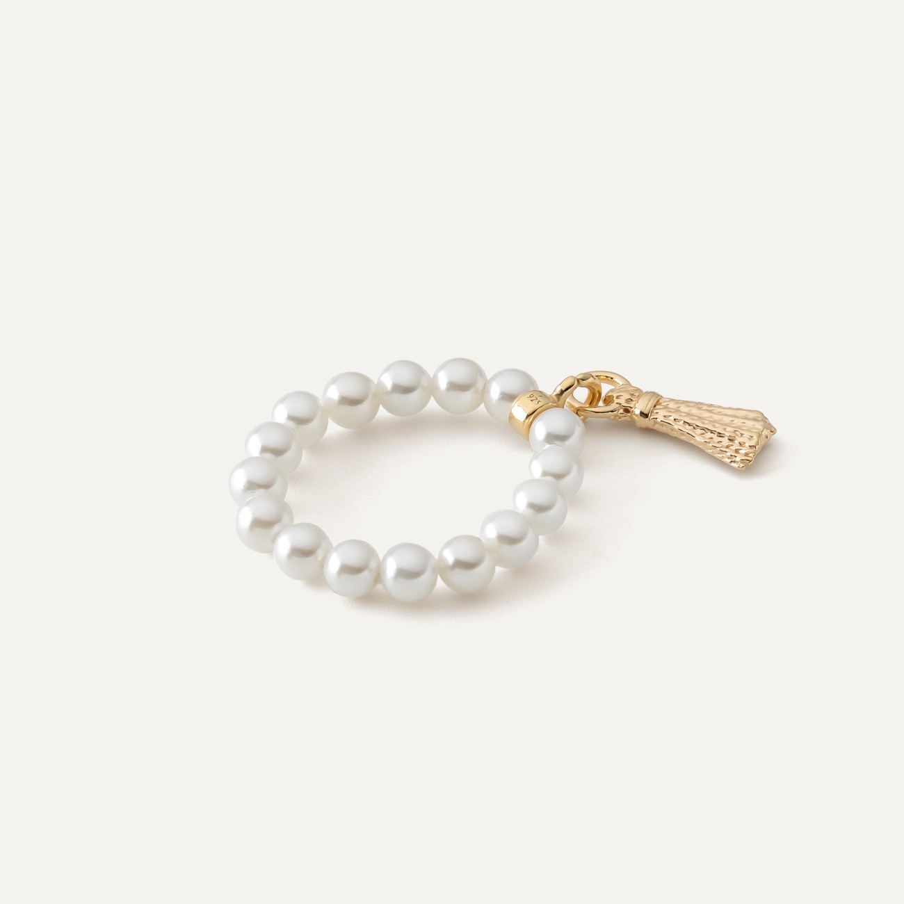 Flexible pearls ring with tassel, silver 925 gold plated