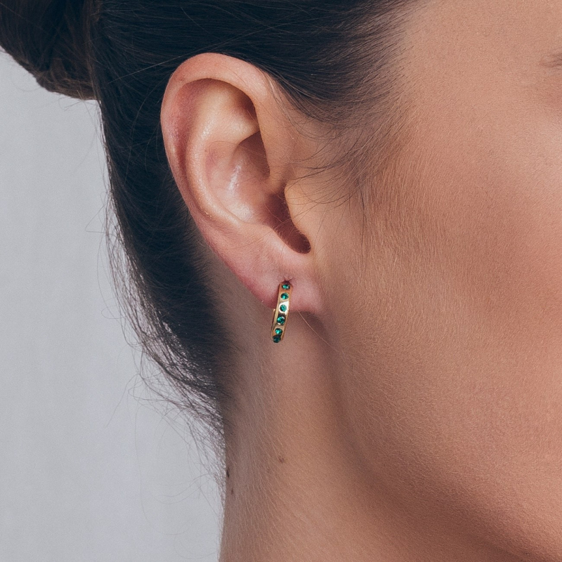 Silver earrings, small circles with green crystals gold plated                                    